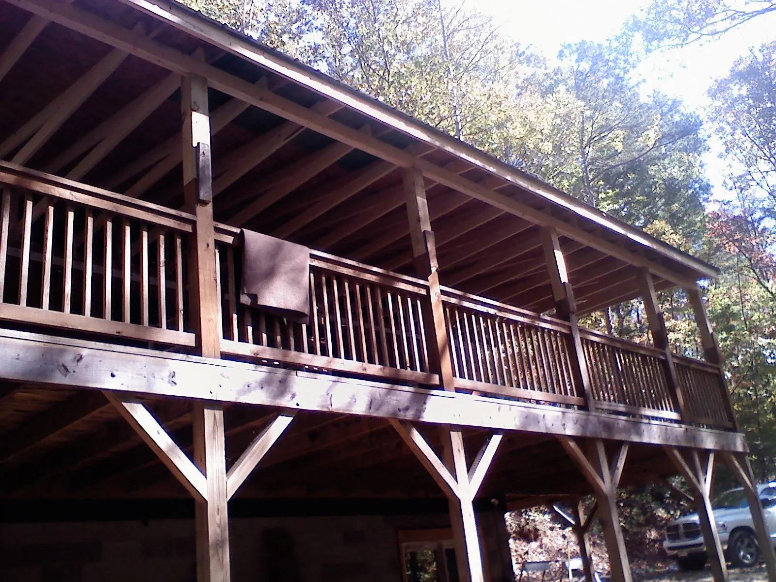 Timber framing under a new elevated porch and deck — Roof Leak Repair in Nebraska City by Roofing Brothers
